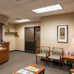 Patient area with reception desk and two chairs