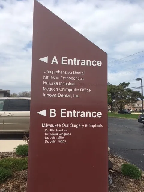 Office sign with directions